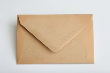 Aufkleber - A brown envelope sits on top of a white table, perfect for sending and receiving mail