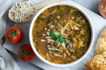 Traditional Turkish thin bar shaped dough soup, homemade noodle soup, bacakli corba