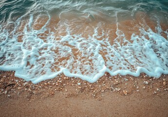 Foamy Waves Crashing on Sandy Shore