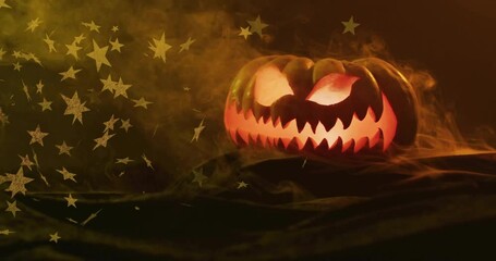 Wall Mural - Glowing jack-o'-lantern with stars animation over smoky background