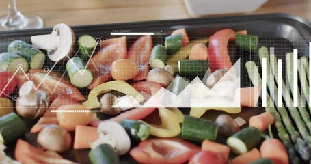 Poster - Graphs and charts animating over fresh vegetables on tray