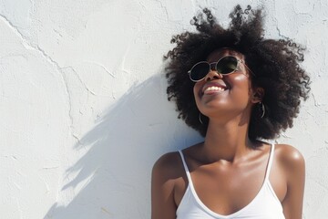 Sticker - A woman in casual wear, sporting sunglasses and a white tank top