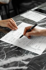 Poster - A person holding a pen and writing on a piece of paper