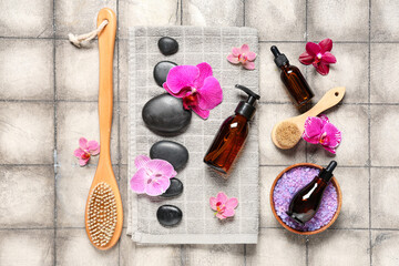 Wall Mural - Composition with spa accessories, cosmetics and orchid flowers on grunge tile background