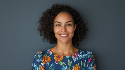 Sticker - A woman with curly hair is smiling and wearing a floral dress