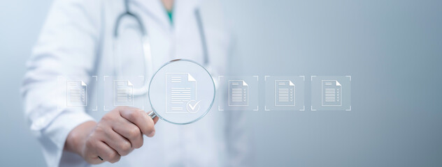 Wall Mural - medical worker holding a magnifying glass search and managing files online document database concept