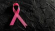 © Ameer - Pink ribbon on a black background, symbolizing breast cancer awareness with a striking, impactful contrast.