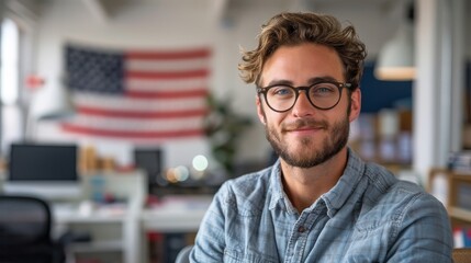 Wall Mural - A photograph of a 25-year-old american man, dressed cool and fashion. he has a warm demeanor, smiling happily. he is at a white and bright american office. There is an USA flag behind him