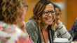 © MikeLegend - Smiling teacher provides personalized feedback during workshop