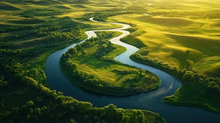 Wall Mural - Aerial View of a Winding River Through Lush Green Hills