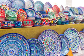 Wall Mural - Multicolored ceramic dishes with oriental ornaments at the Siab Bazaar.