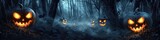 Spooky Halloween in dark woods with glowing pumpkin faces amidst the mist.