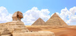 © frenta - Famous Great Sphinx and pyramids of Chephren and Cheops, Cairo, Egypt. Great Pyramids and ancient statue of Sphinx, mythical creature with head of man and body of lion, Giza complex (Giza Necropolis)