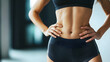 © Oksana_Latysheva - Variation1wCloseup woman body. Fitness woman showing abs and flat belly isolated on white background