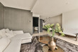 © ADDICTIVE STOCK - Modern living room interior with elegant decorations