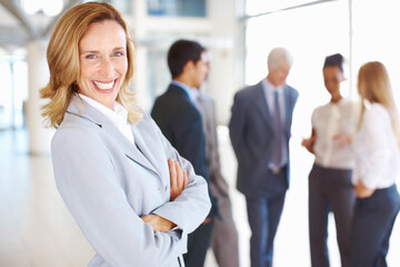 Aufkleber - Arms crossed, portrait and smile of business woman in office with team for accounting, finance or wealth management. Confident, corporate and happy with leader in professional workplace for career