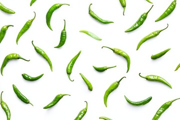 Poster - Slices of green hot chili falling in the air isolated on a white background with herbs and spices for garnishing.