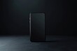 © Anton - Black smartphone on dark background with copy space