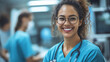 © P2Man - Smiling Nurse in Scrubs with Stethoscope in a Hospital Setting