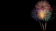 © Fathor - colorful fireworks on the black sky background with free space for text. Celebration and anniversary concept.generative ai