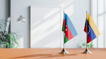 FLAGS OF AZERBAIJAN AND VENEZUELA ON TABLE