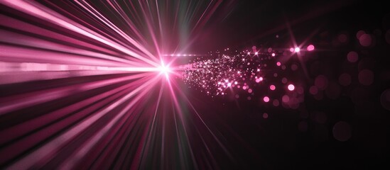 Pink lens flare emanating abstractly on black backdrop resembling a ray of light in an image with empty space for content. Creative banner. Copyspace image