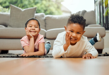 Poster - Portrait, kids and happy siblings on floor in home for relax, love and children bonding together in living room. Face, brother and sister smile on carpet with family, boy and cute young girl in house