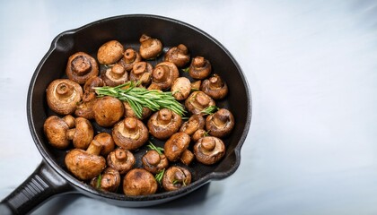 Wall Mural - a pan of mushrooms is sitting on a table with a bunch of herbs the mushrooms are cooked and look delicious