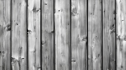 A striking black-and-white photograph showcasing the high-contrast textures of wooden planks, emphasizing their intricate patterns and natural beauty in a minimalist, timeless style.