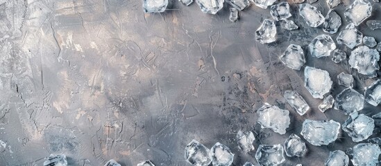 Leinwandbilder - Top view of a crushed ice frame on a grey background with ample space for text