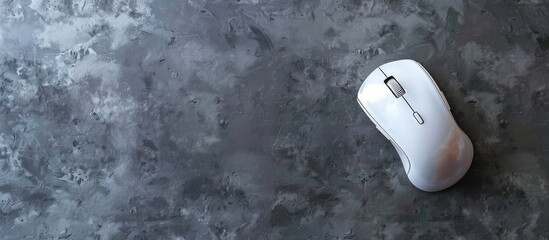 Poster - Top view of a mouse and mousepad arrangement on a grey backdrop providing space for text in the image. Creative banner. Copyspace image