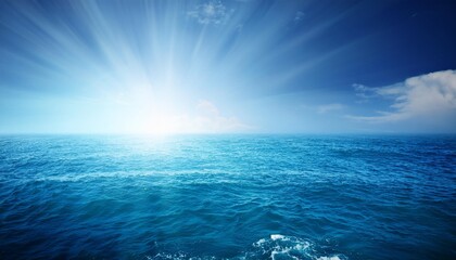 Wall Mural - beautiful blue ocean background with sunlight and un
