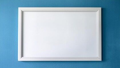 Sticker - a large white framed picture hangs on a blue wall