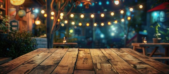 Poster - A wooden table is placed in a vibrant restaurant scene at night offering an ideal spot for promoting food products with copy space image