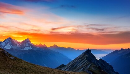 Wall Mural - sunset in the mountains with orange and blue colors