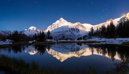 Canvas Print - reflection of snow covered mountain in pond during night