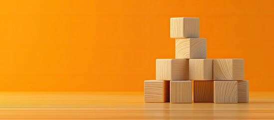 Poster - Message for going back to school displayed on wooden blocks against an orange backdrop serving as a symbolic representation with room for additional images