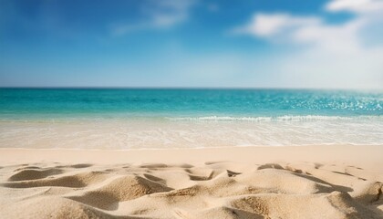 Wall Mural - summer sandy beach with blur ocean on background