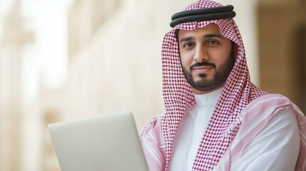 Wall Mural - Arab man with a laptop