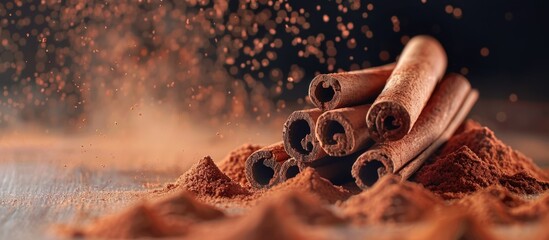 Poster - Cinnamon sticks and powder in a copy space image