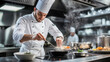 © Tuwaporn - Professional chef cooking in a modern kitchen