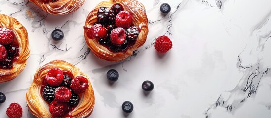 Poster - Top view of delectable berry filled puff pastries displayed on a white marble surface featuring ample copy space image