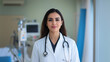 © Jane - Portrait of  Middle Eastern  female woman doctor in white coat with stethoscope smiling clinic hospital background