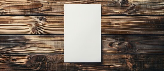 Aufkleber - Wooden background with a blank white paper providing copy space for your text