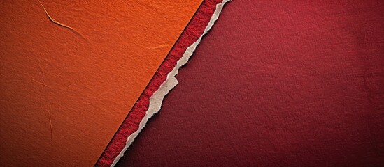 Leinwandbilder - Vintage abstract red cardboard background with white and orange border perfect for presentations and mockups with ample copy space image showcasing a dark maroon textured craft paper with a felt backd