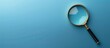 © HN Works - Late payment symbol on a magnifying glass against a beautiful blue background representing business concepts with a copy space image