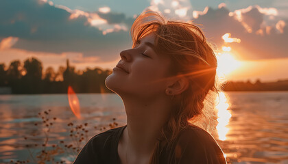 Poster - A woman is smiling and looking at the sun