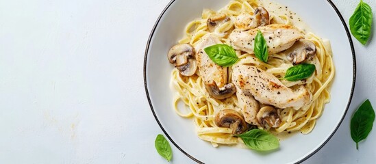 Fototapete - Italian creamy pasta with chicken and mushrooms garnished with basil sauce top view Classic Italian lunch idea. with copy space image. Place for adding text or design