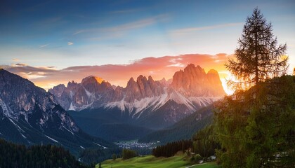 Wall Mural - beautiful scenery of mountain ranges in dobbiaco dolomites during sunset