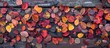 © vxnaghiyev - Creative arrangement of vibrant autumn leaves on a weathered wooden surface A gradient of fall leaf colors Top view copyspace